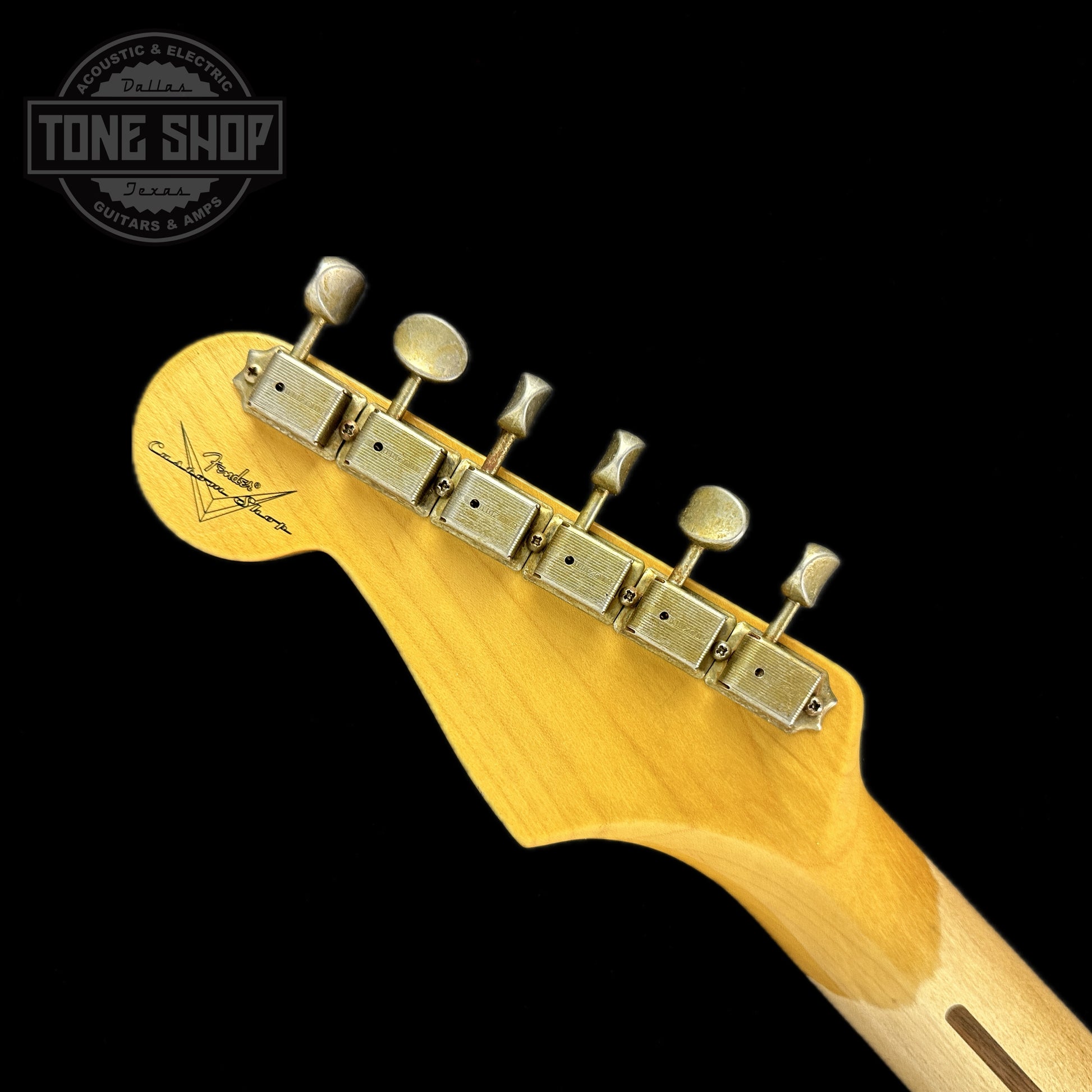 Back of headstock of Fender 1956 Stratocaster Journeyman Relic Maple Neck Wide-Fade 2-Color Sunburst.