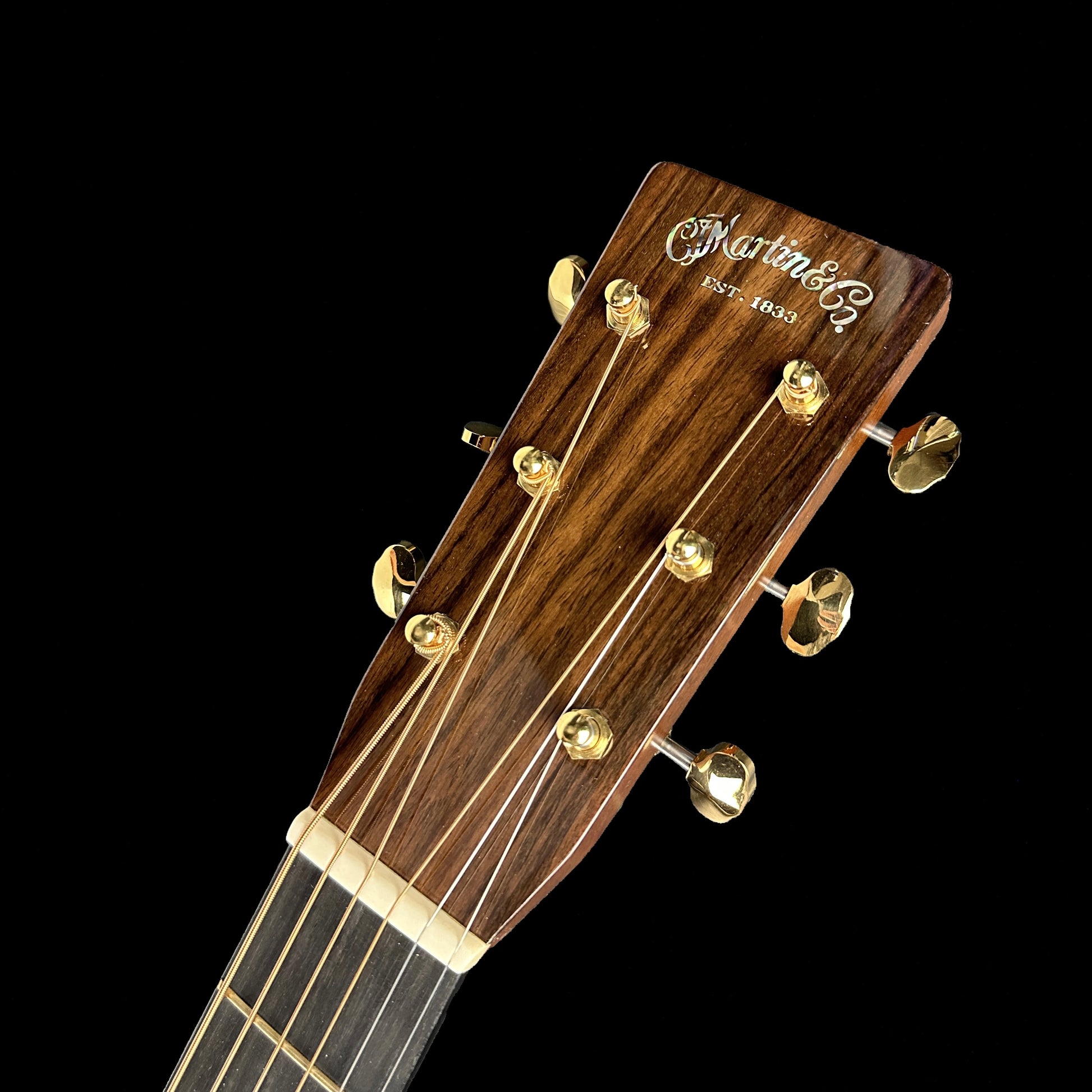 Front of headstock of Used Martin OM-28 Modern Deluxe.