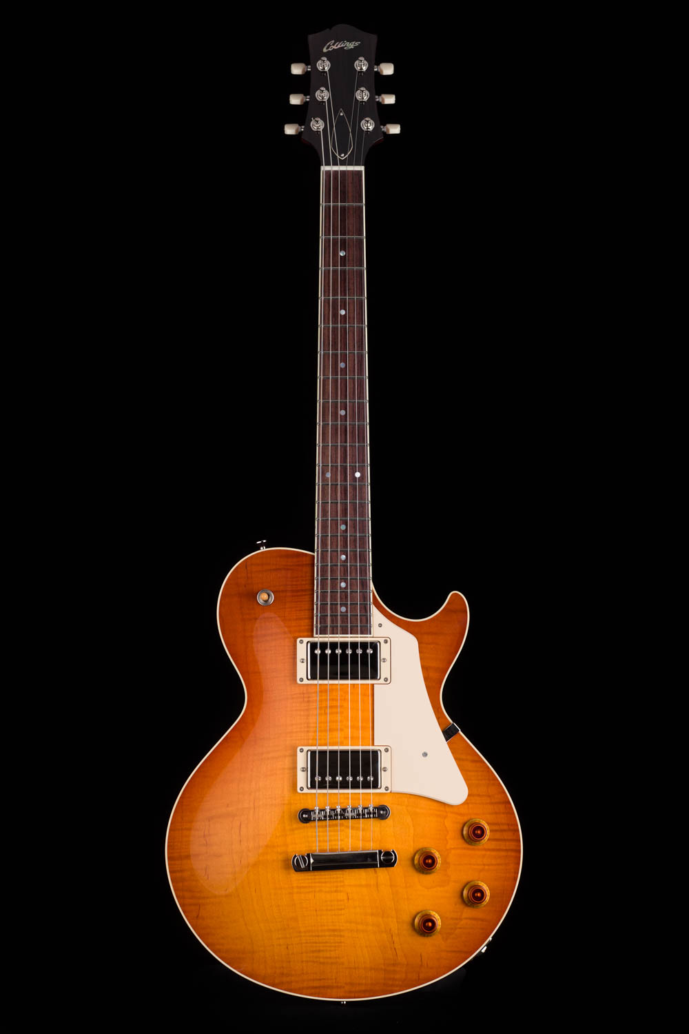 Collings Electric Guitar sunburst against a black background.