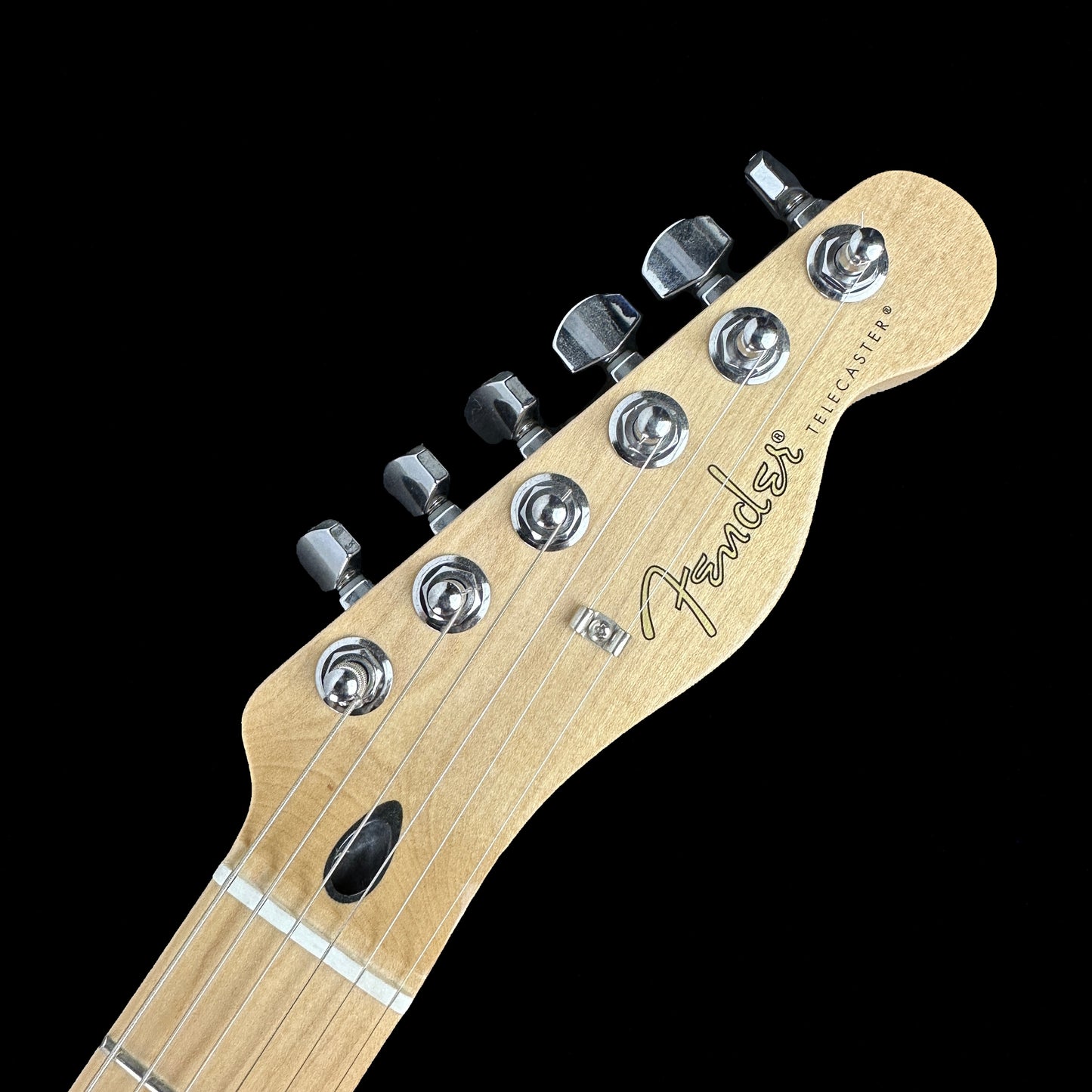 Front of headstock of Used Fender Player Telecaster Plus Top Sienna Sunburst.