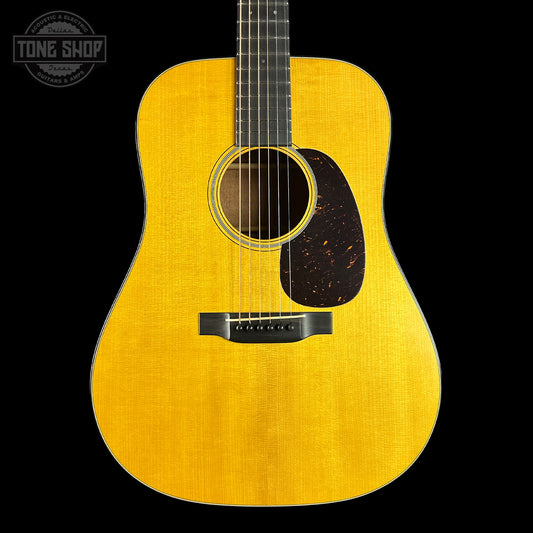 Natural Aged Top acoustic guitar on a black background with 'Tone Shop' logo.