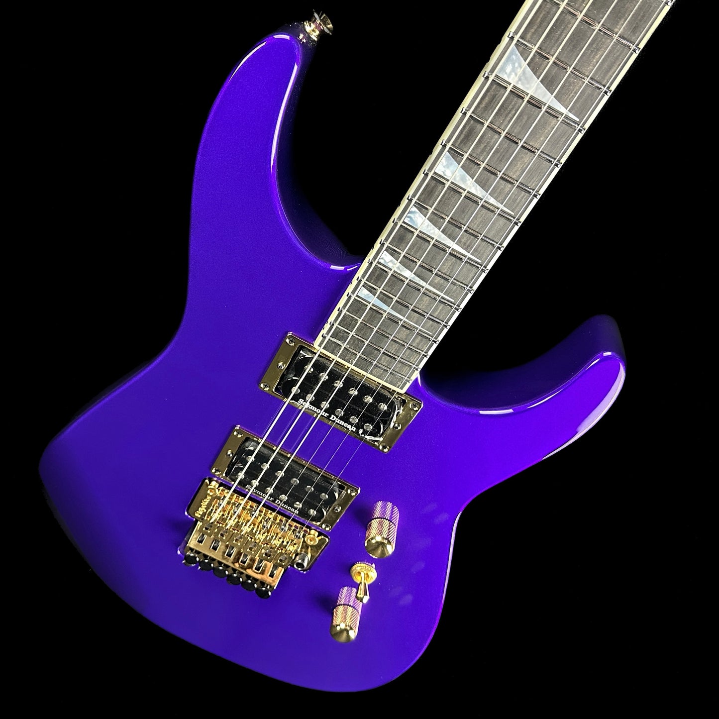 Front angle of Jackson Custom Shop SL 2H Floyd Rose Purple Metallic.
