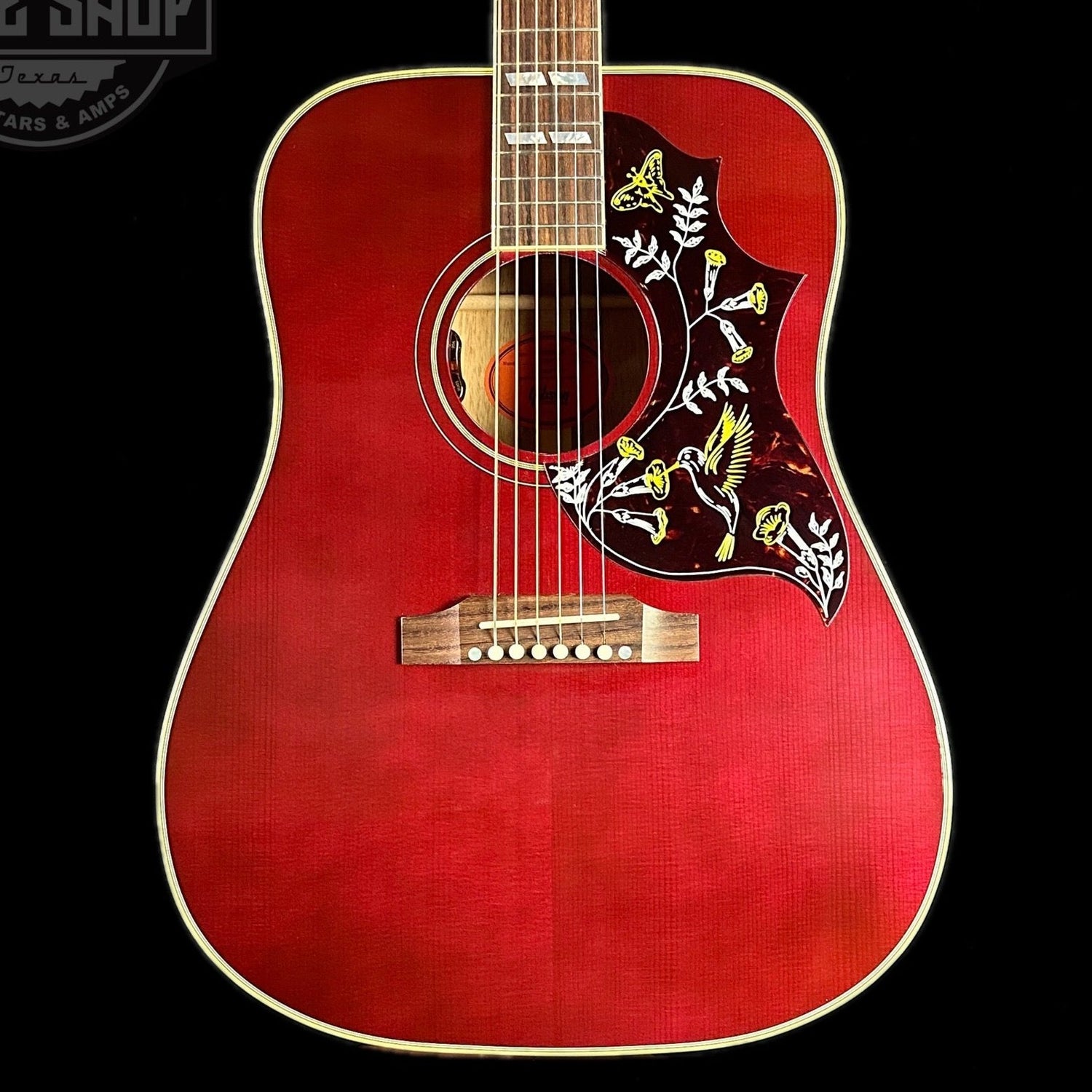 Front of body of Gibson Custom Shop M2M Hummingbird Original Wine Red.