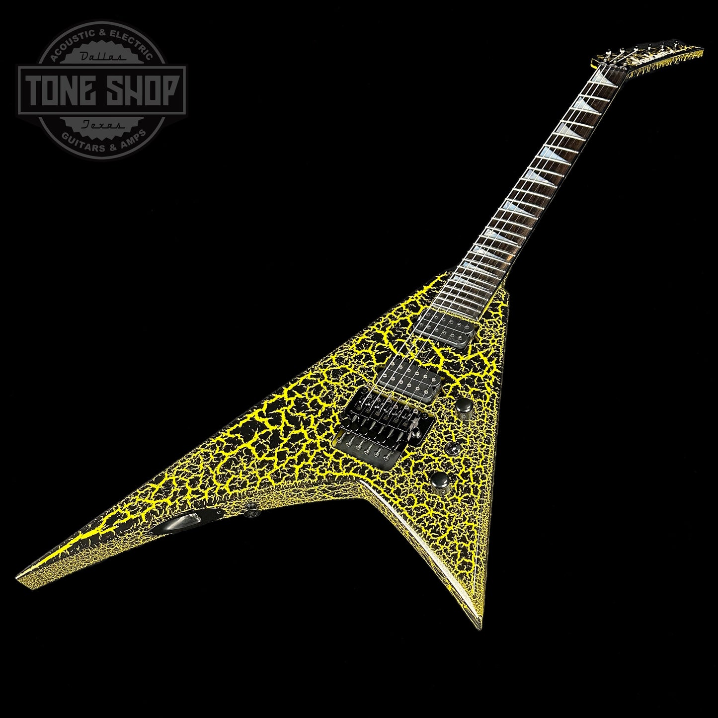 Front angle of Jackson Custom Shop Limited Edition Randy Rhoads Nos Black With Yellow Crackle.