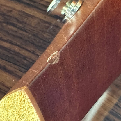 Ding on neck joint of Used Taylor 818e.
