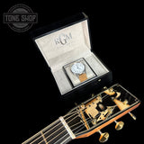 Martin OM 20th Century Limited with watch.