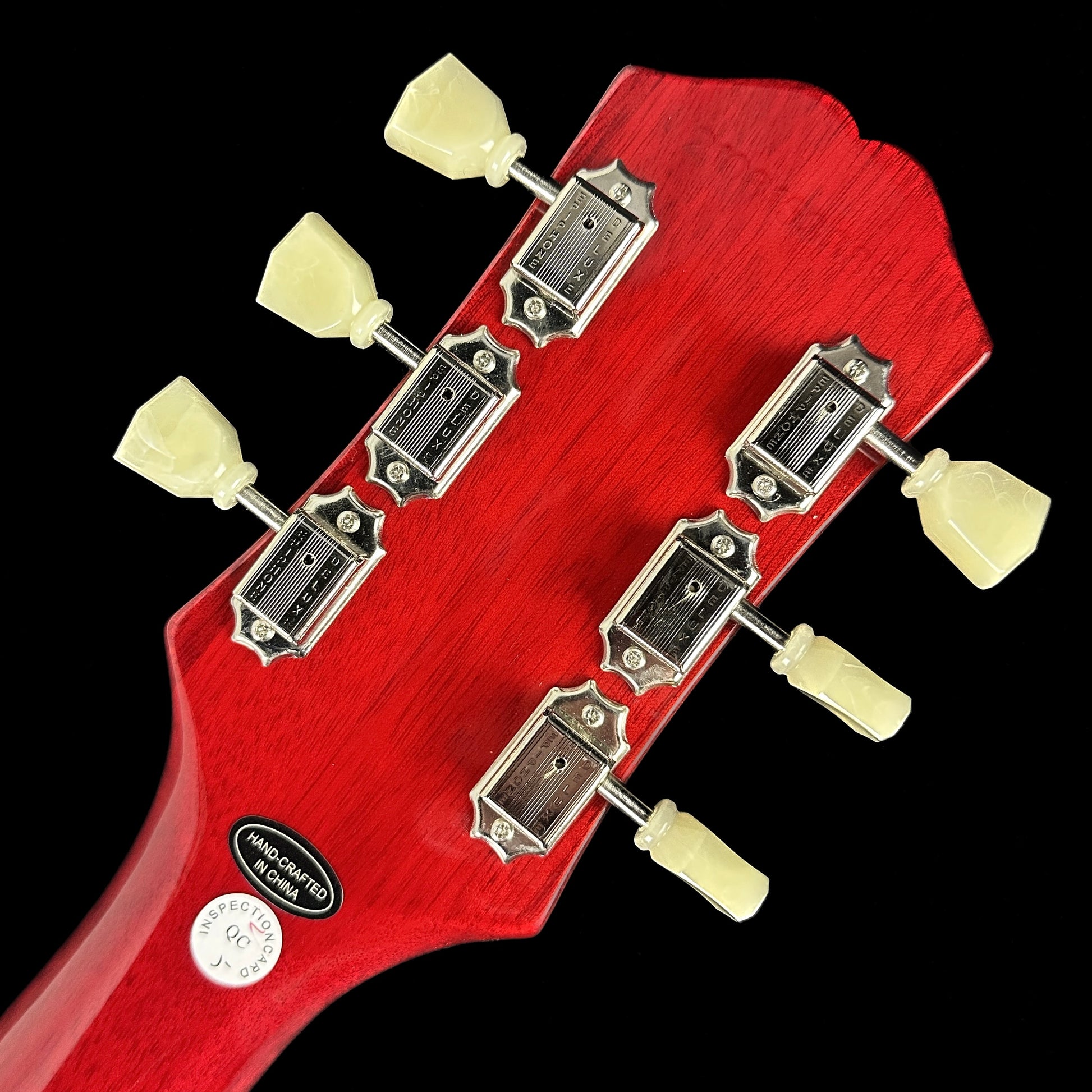 Back of headstock of Used Epiphone SG Standard Cherry.