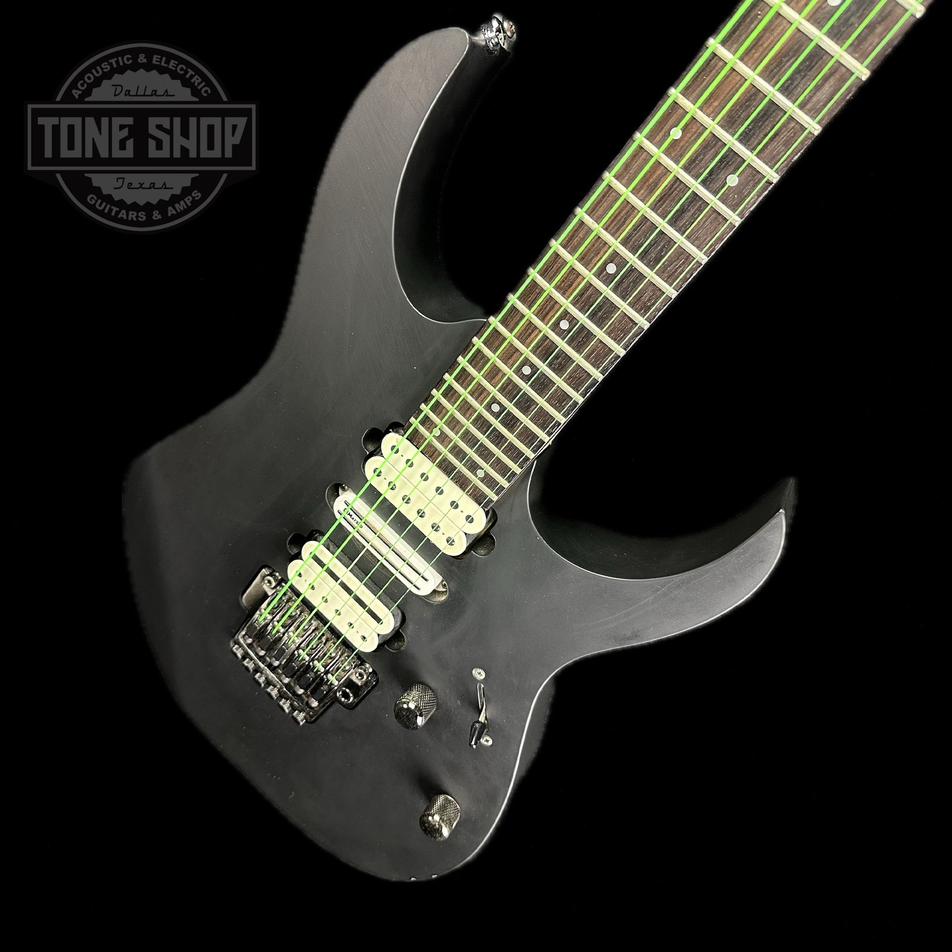 Front angle of Used Ibanez Prestige RG157OR Suede Black.