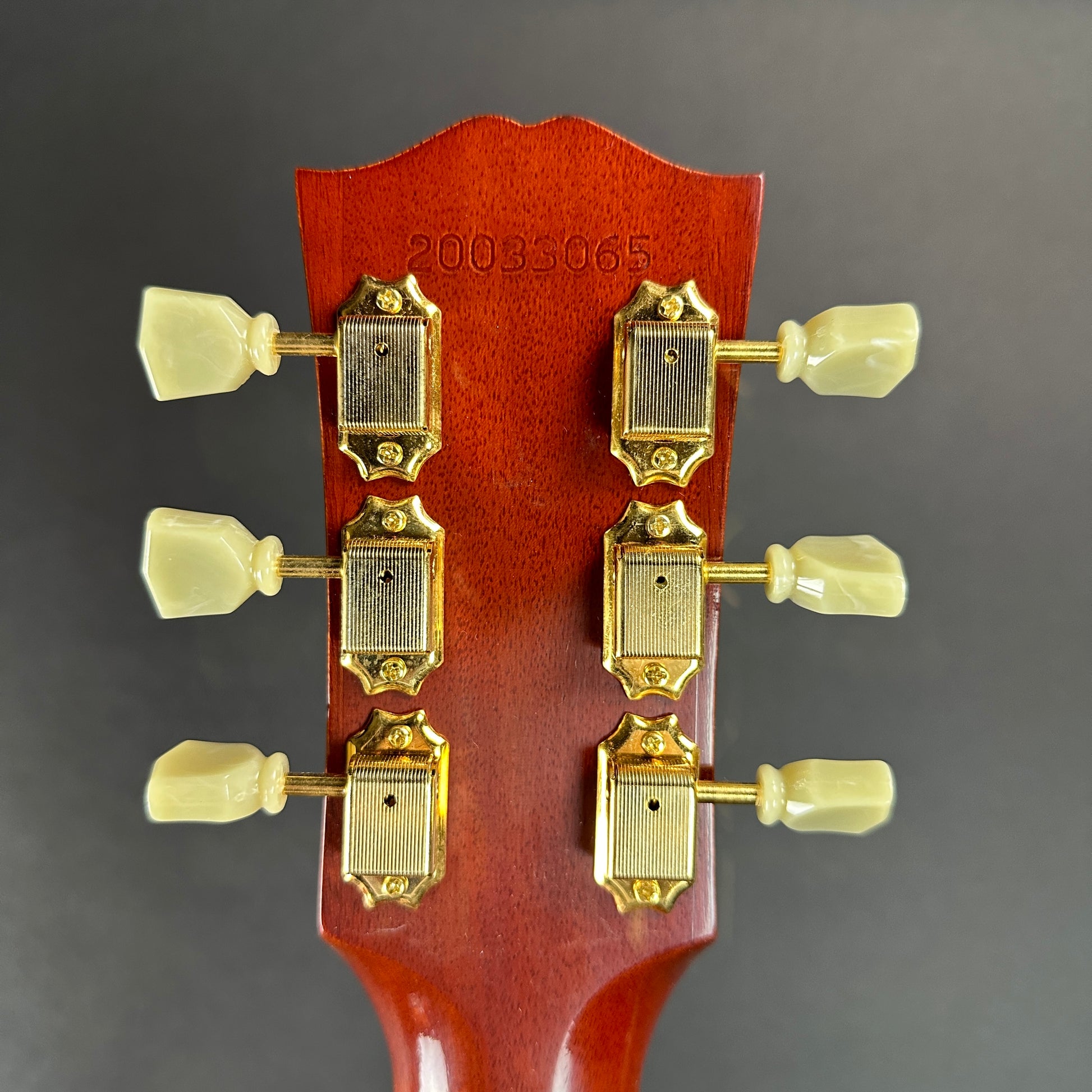 Back of headstock of Used 2022 Gibson 1960 Hummingbird Cherry Sunburst.