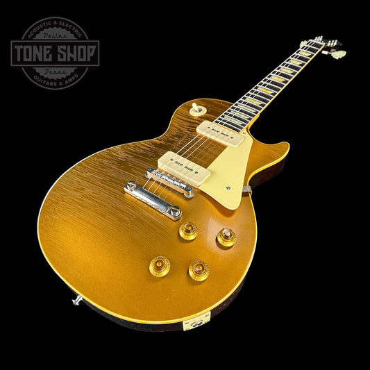 Front angle of Gibson Custom Shop M2M 1956 Les Paul Standard Chambered Goldtop Murphy Lab Light Aged.