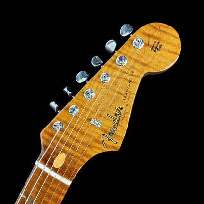 Front of headstock of Fender Custom Shop Limited Edition Roasted Pine Chocolate 2 Tone Sunburst.