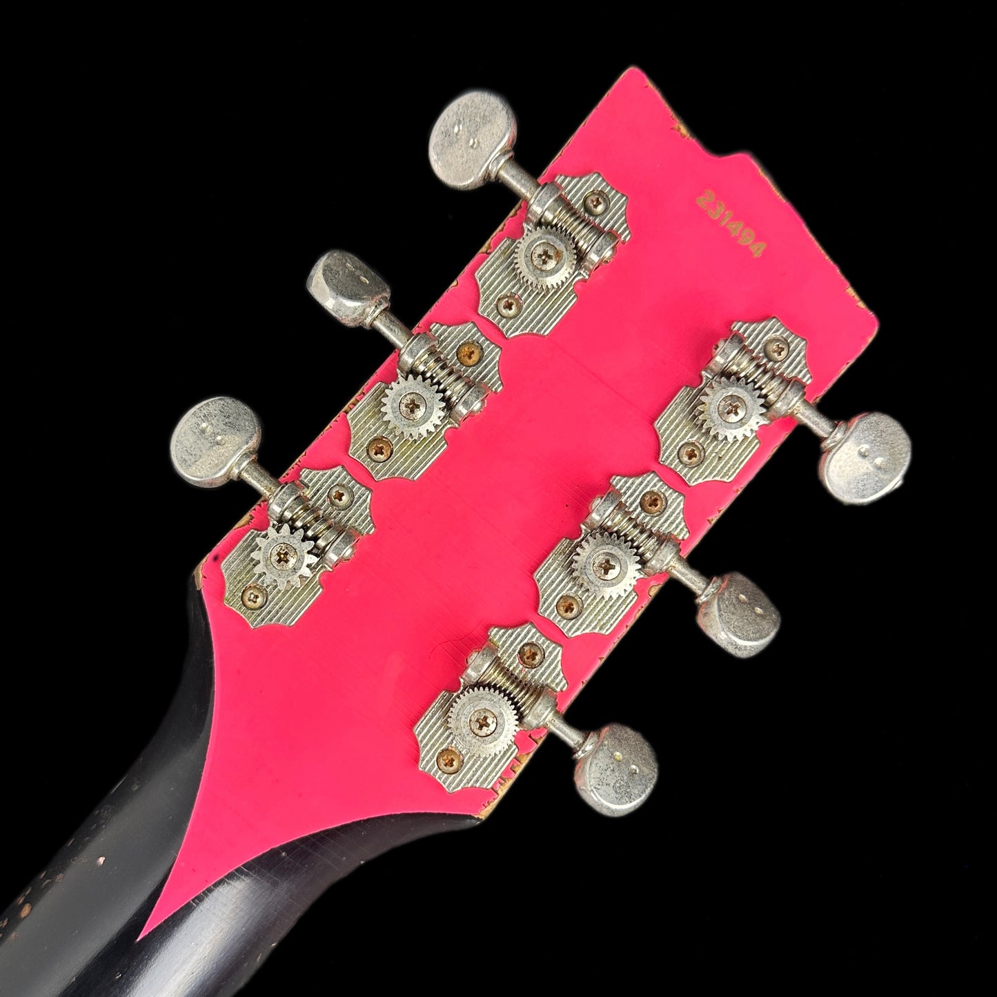 Back of headstock of Rock N Roll Relics Thunders DC Black w/Pink.