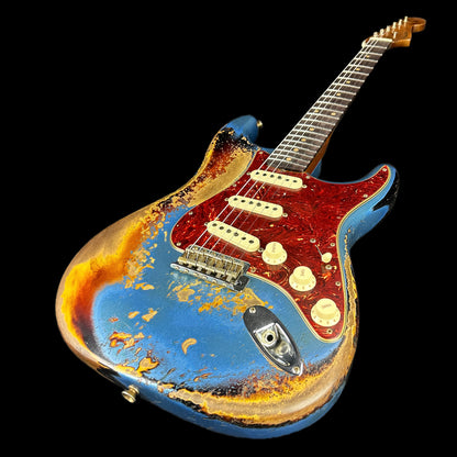Front angle of Fender Custom Shop Limited Edition Roasted '60 Strat Super Heavy Relic Aged Lake Placid Blue Over 3 Color Sunburst.