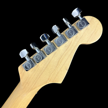 Back of headstock of Used Fender Standard Stratocaster Left Hand Burgundy.
