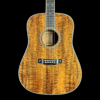 Front of body of Martin Custom Shop 42 Style Dread All Exceptional Figured Koa.