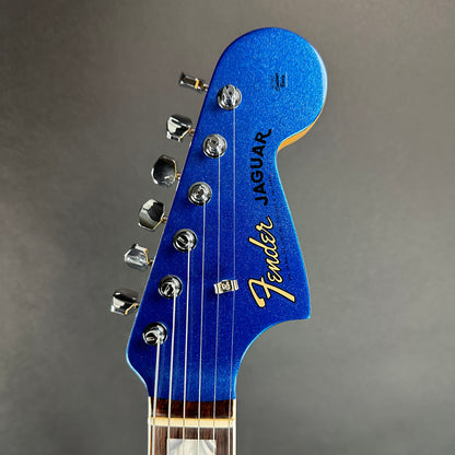 Front of headstock of Used Fender 60th Anniversary Jaguar Mystic Lake Placid Blue.