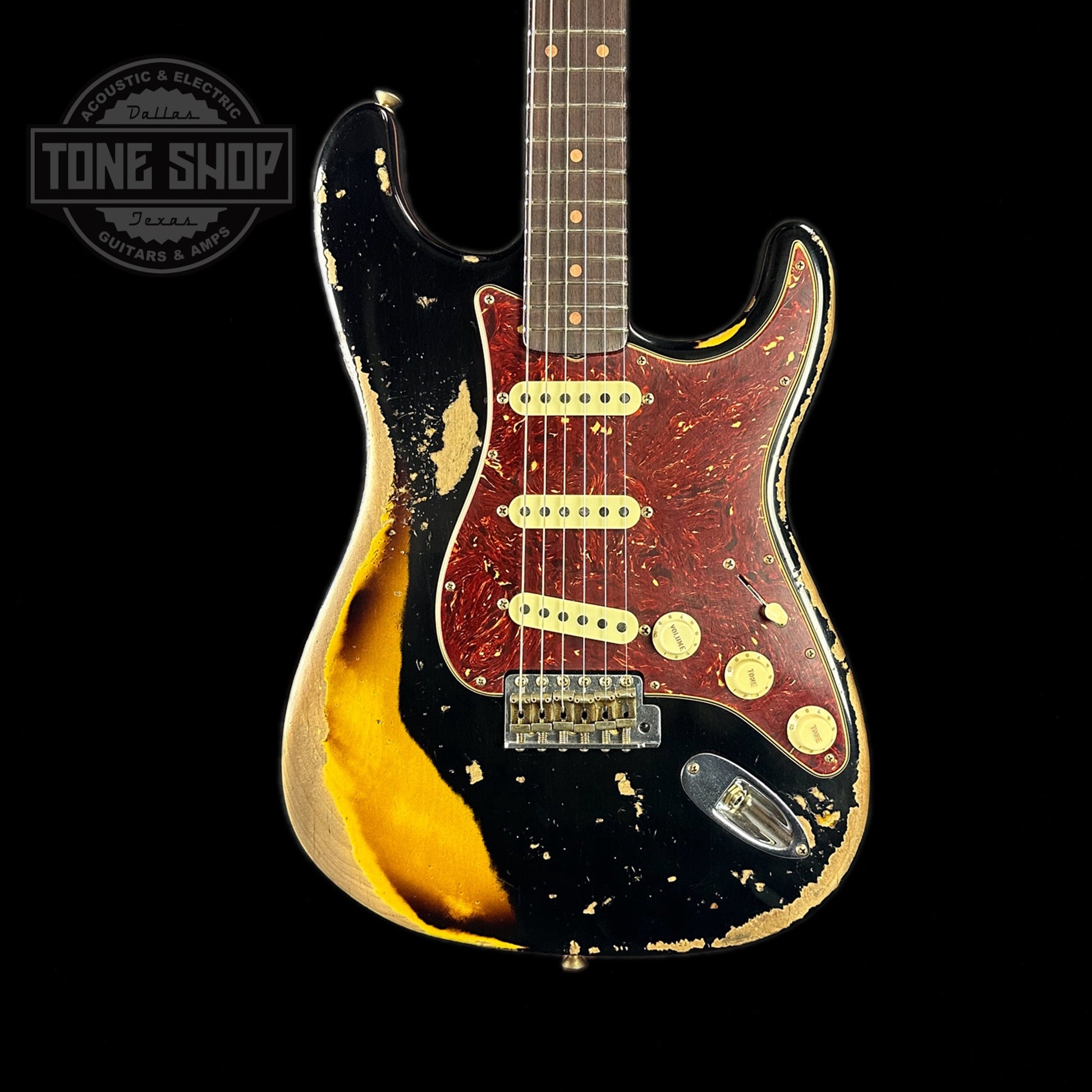 Front of body of Fender Custom Shop Limited Edition Roasted '60 Strat Super Heavy Relic Aged Black Over 3 Color Sunburst.