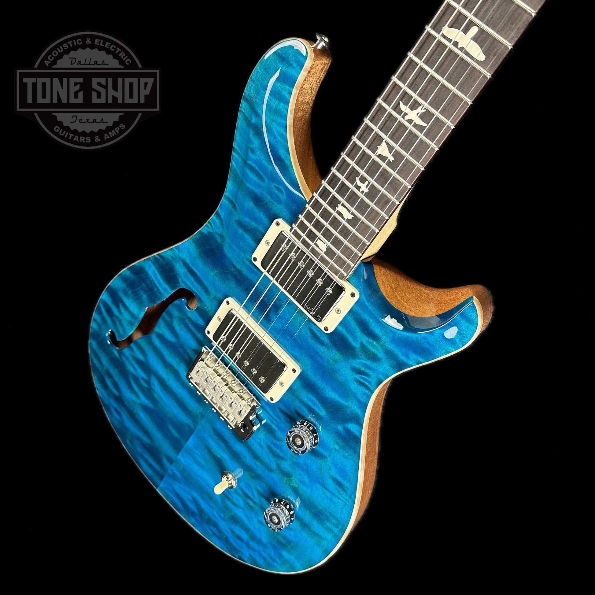 Front angle of PRS Paul Reed Smith CE24 Semi-Hollow Quilt Blue Matteo.