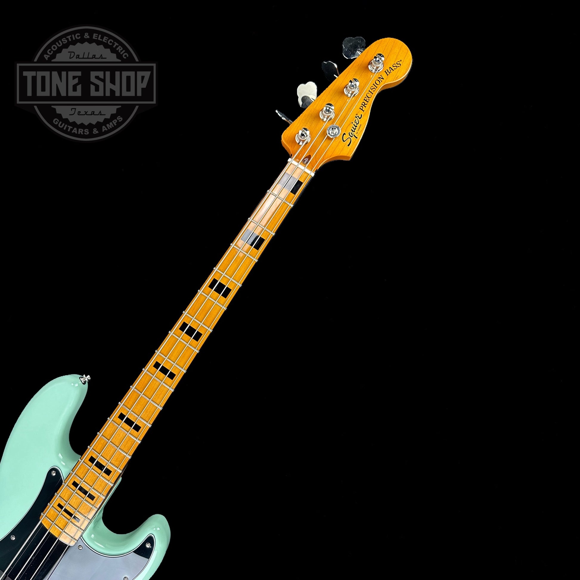 Fretboard of Used Squier Classic Vibe 70's Precision Bass Surf Green.