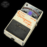 Boss TU-2 Chromatic Tuner pedal on a black background with 'Tone Shop' logo.