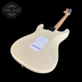 Back angle of Fender 1968 Stratocaster DLX Closet Classic Maple Neck Aged Vintage White.
