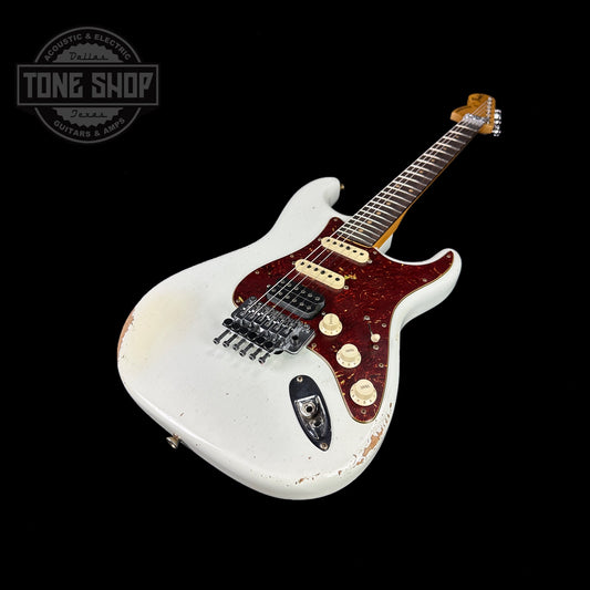Front angle of Fender Custom Shop 69 Stratocaster Relic HSS Oly White Reverse Headstock.