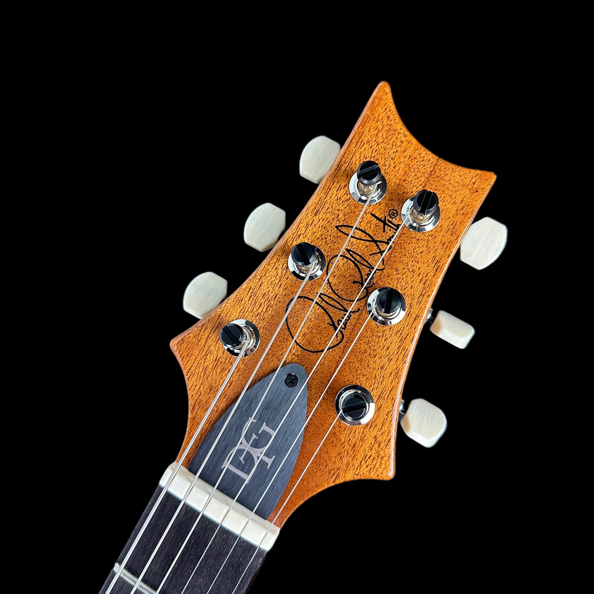 Front of headstock of PRS Paul Reed Smith DGT David Grissom Trem Eriza Verde Moons.