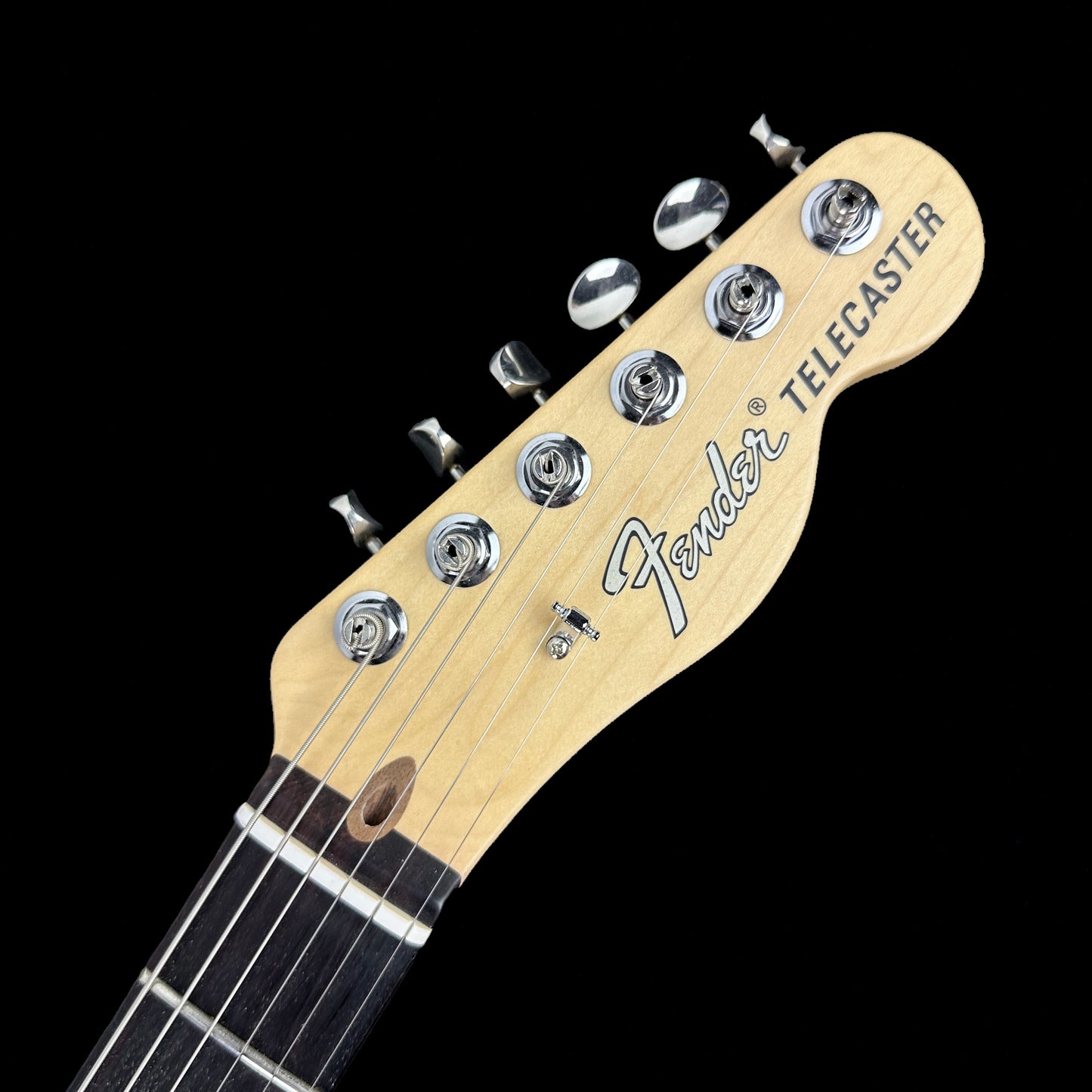 Front of headstock of Used Fender American Performer Telecaster Honeyburst.