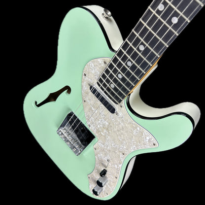 Front angle of Used Fender Limited Two Tone Telecaster Thinline Seafoam Green.