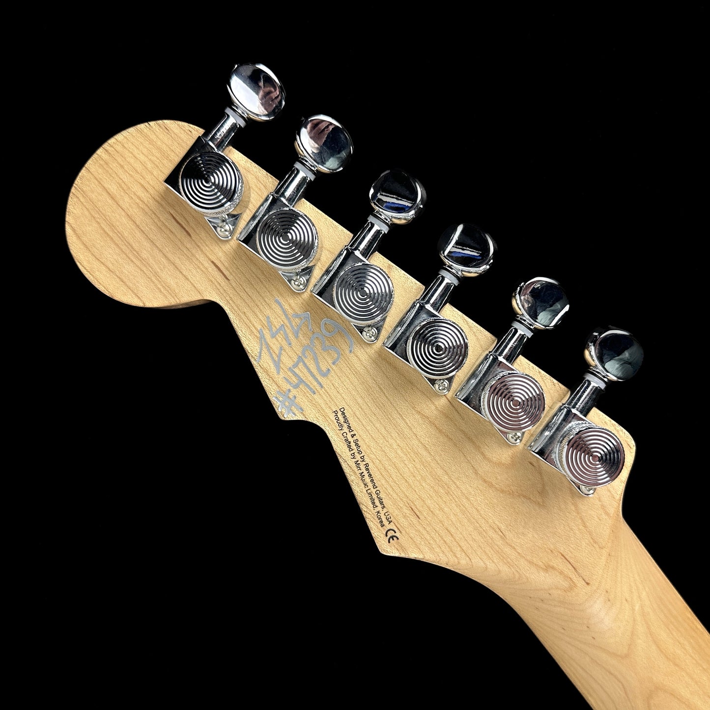 Back of headstock of Used Reverend Descent Baritone Trans White.
