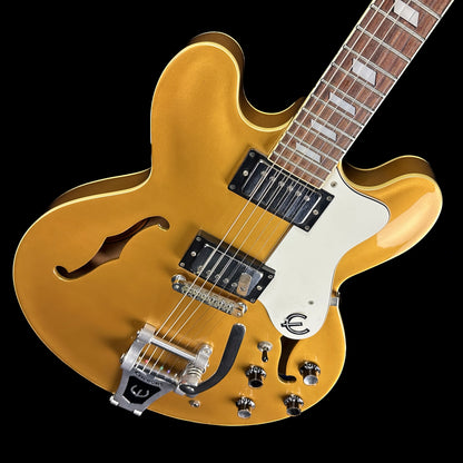 Front angle of Used Epiphone Riviera w/bigsby Gold Sparkle.