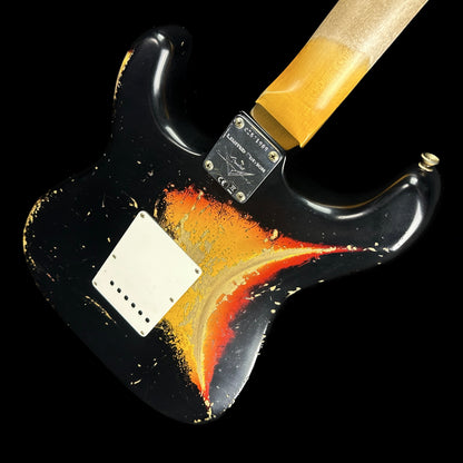 Back angle of Fender Custom Shop Limited Edition '62 Strat Heavy Relic Aged Black Over 3 Color Sunburst.