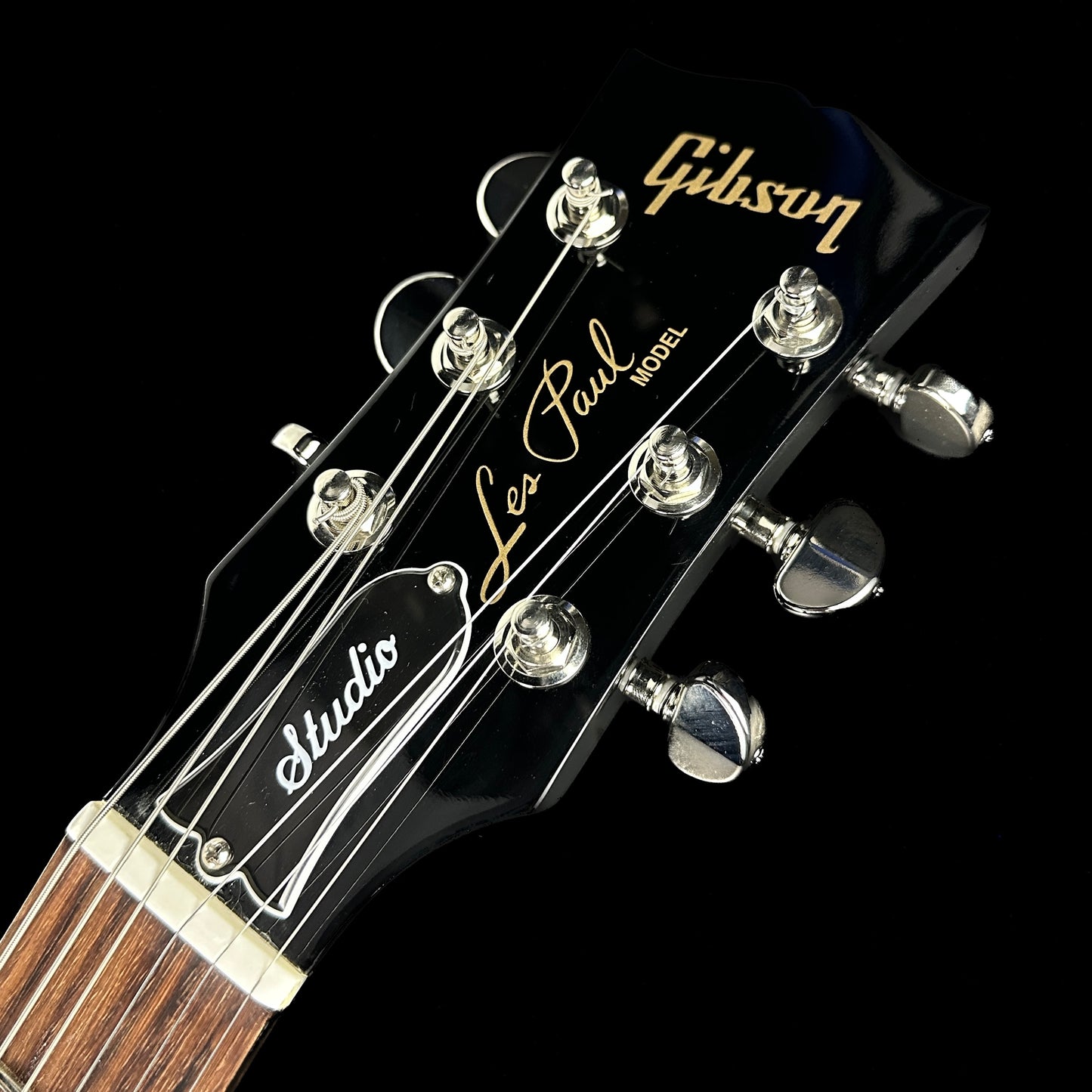 Front of headstock of Used 2008 Gibson Les Paul Studio Ebony.