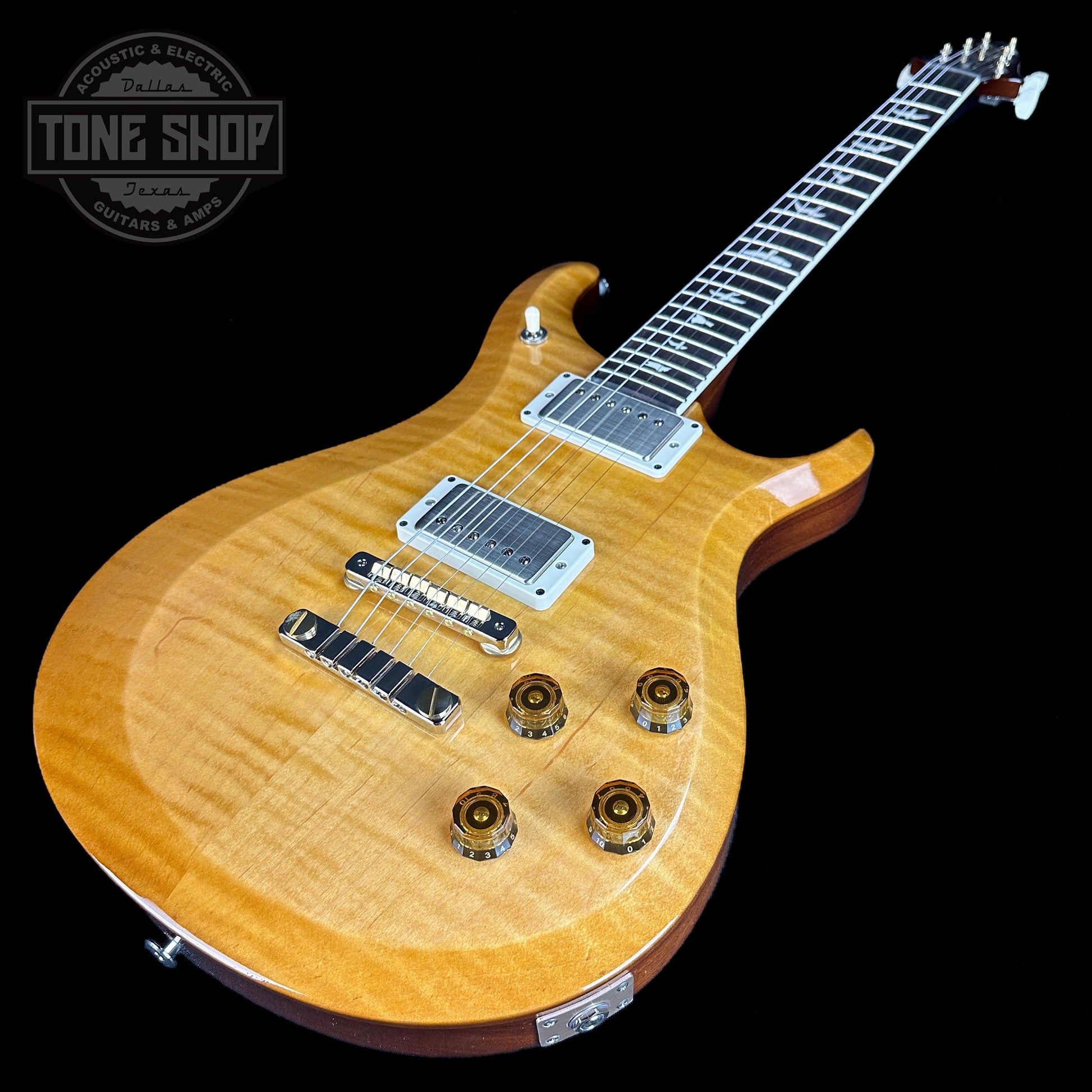 Front angle of PRS S2 McCarty 594 Flame Top Honey.