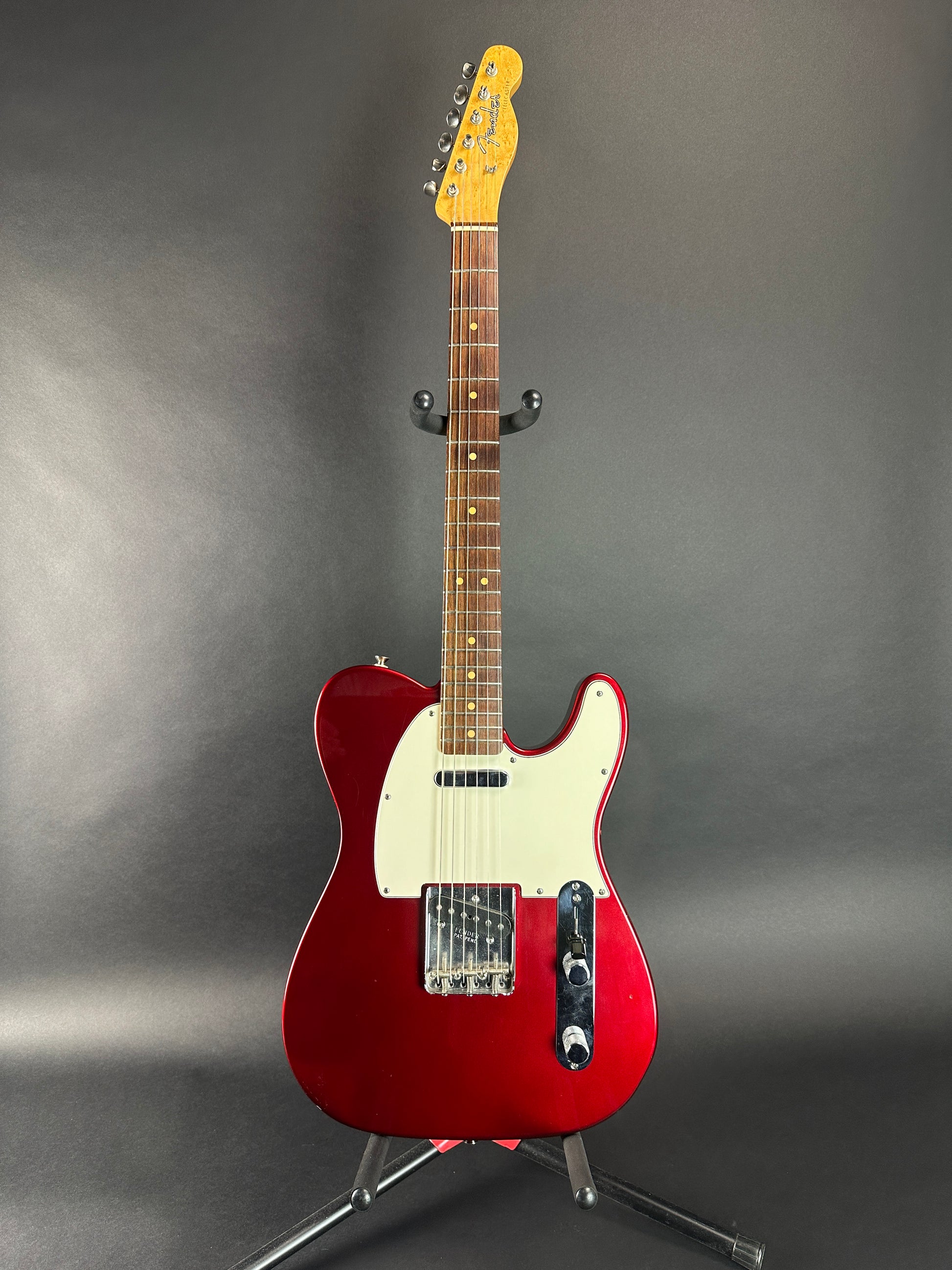 Full front of Used 2000 Fender Custom Shop 63 Telecaster NOS Candy Apple Red.