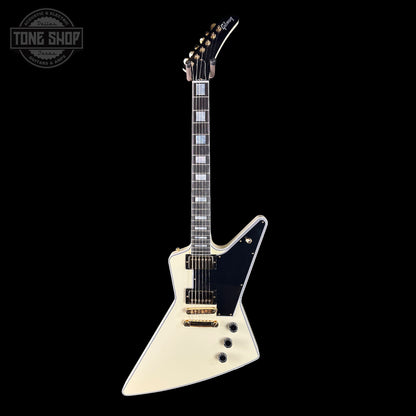 White electric guitar with black pickguard on a white background, featuring 'Tone Shop' logo.