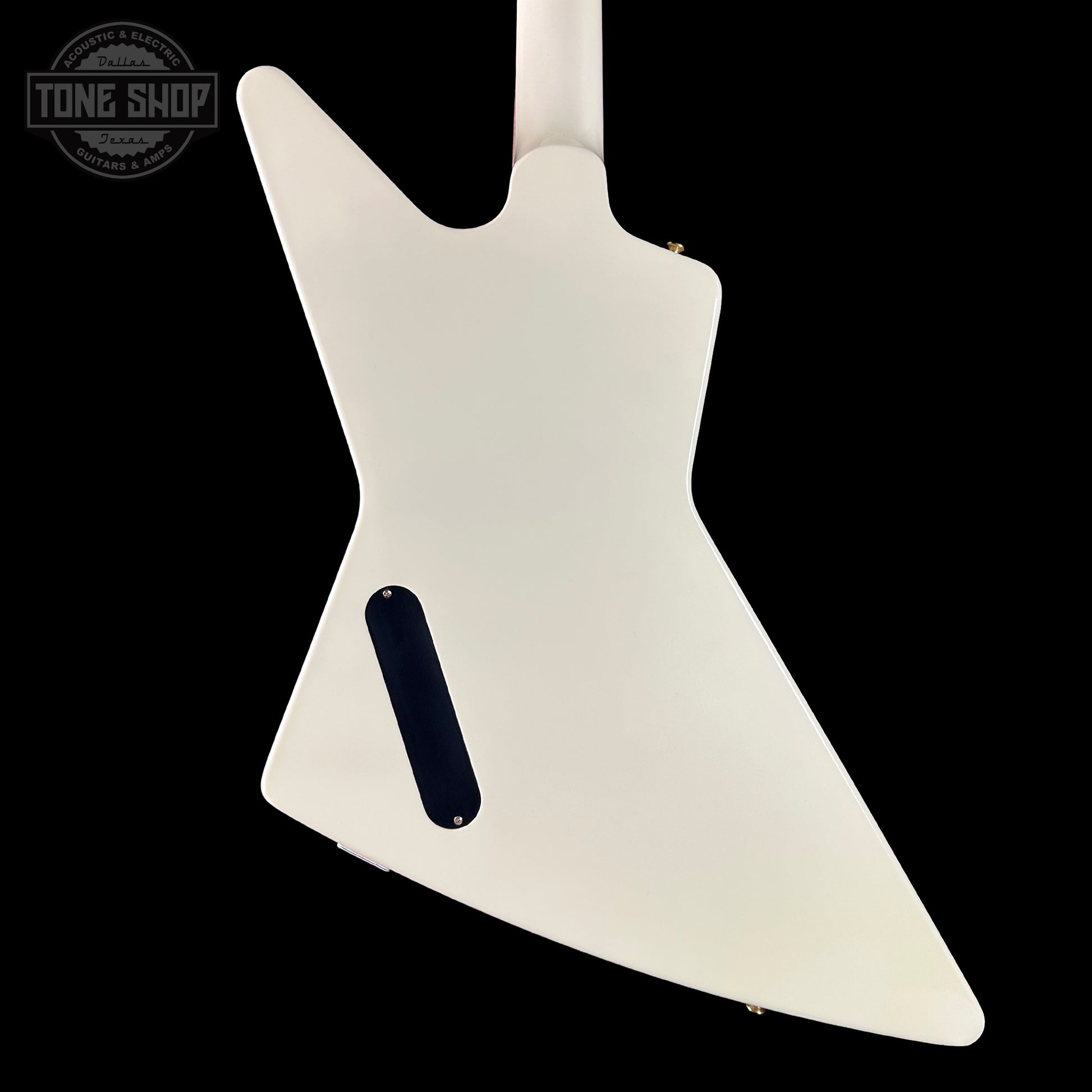 White guitar body with a black pickguard on a black background, featuring 'Tone Shop' logo.