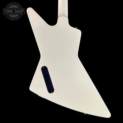 White guitar body with a black pickguard on a black background, featuring 'Tone Shop' logo.