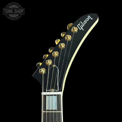 Gibson guitar headstock on a black background with 'Tone Shop' logo.