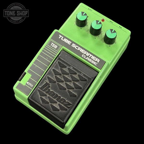 Ibanez Tube Screamer Classic guitar effects pedal on a black background with 'Tone Shop' logo.