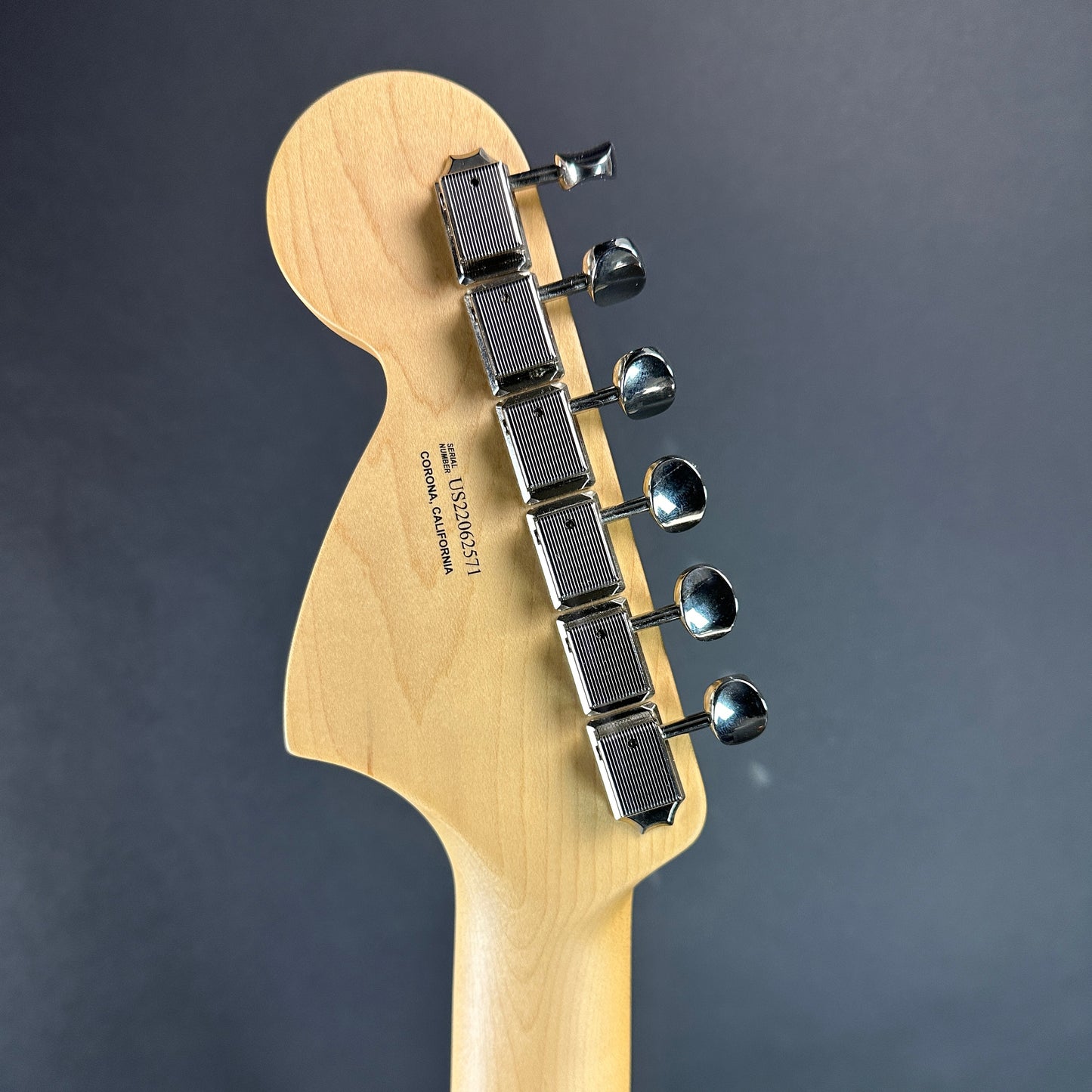 Back of headstock of Used Fender American Performer Stratocaster RW Honey Burst.