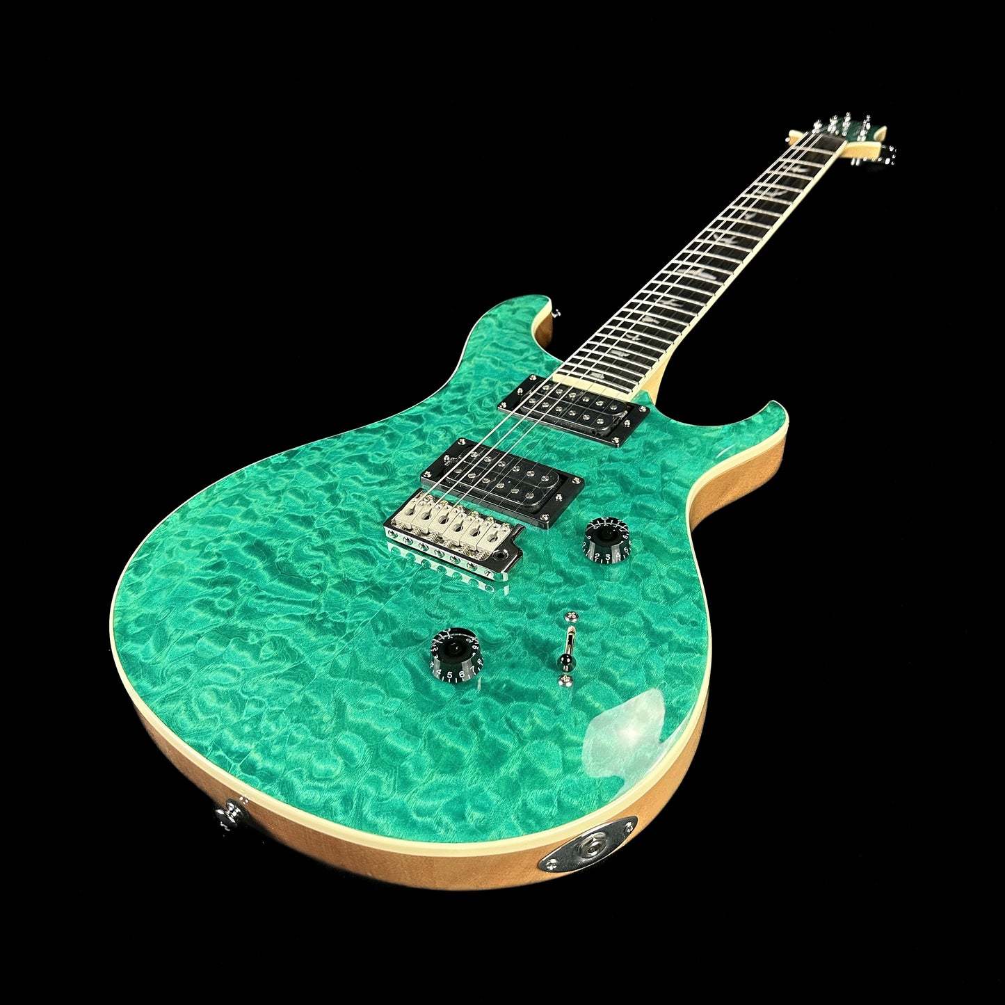 Front angle of PRS Paul Reed Smith SE Custom 24 Quilt Top Turquoise.