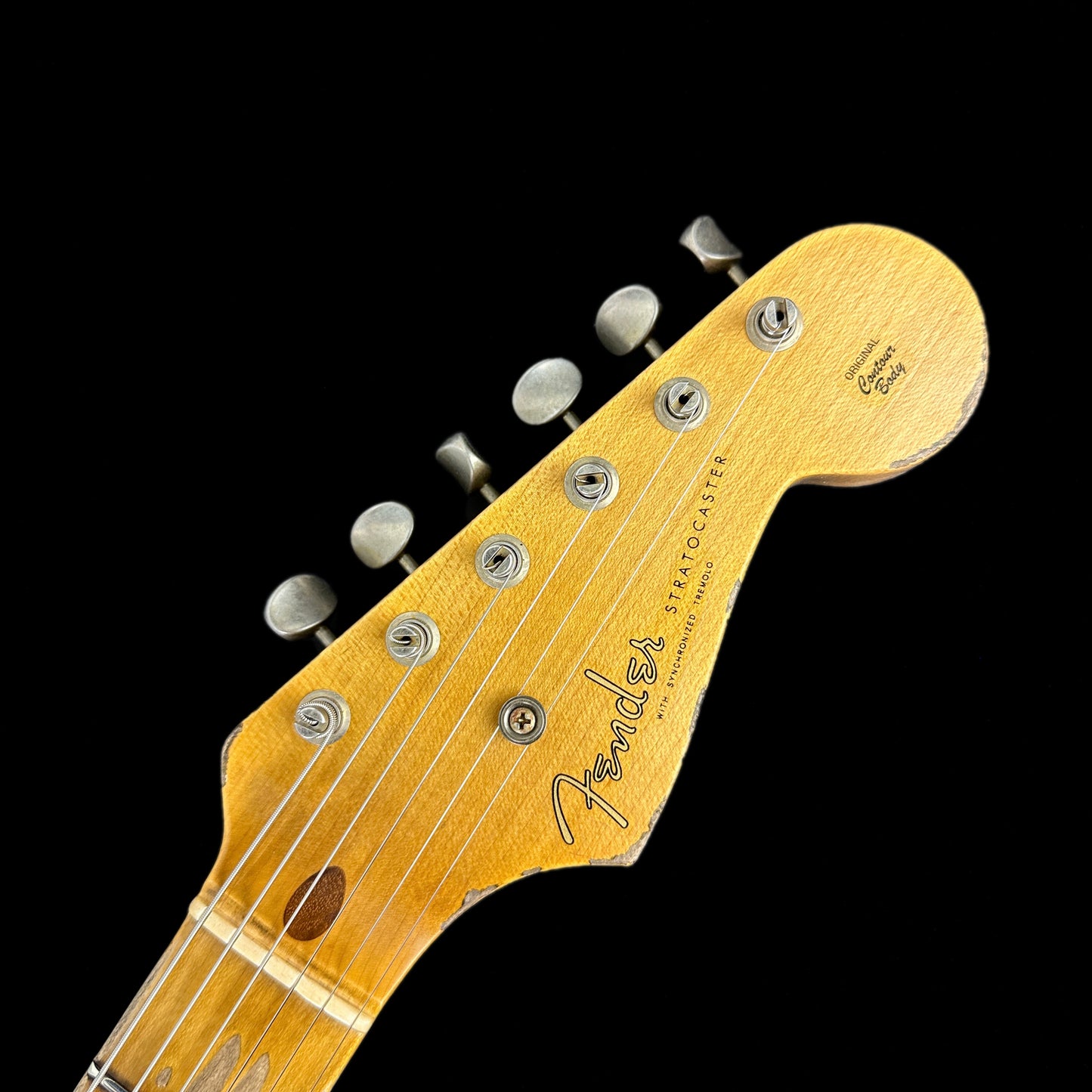 Front of headstock of Fender Custom Shop LTD 70th Anniversary 1954 Stratocaster Heavy Relic 2-Color Sunburst.