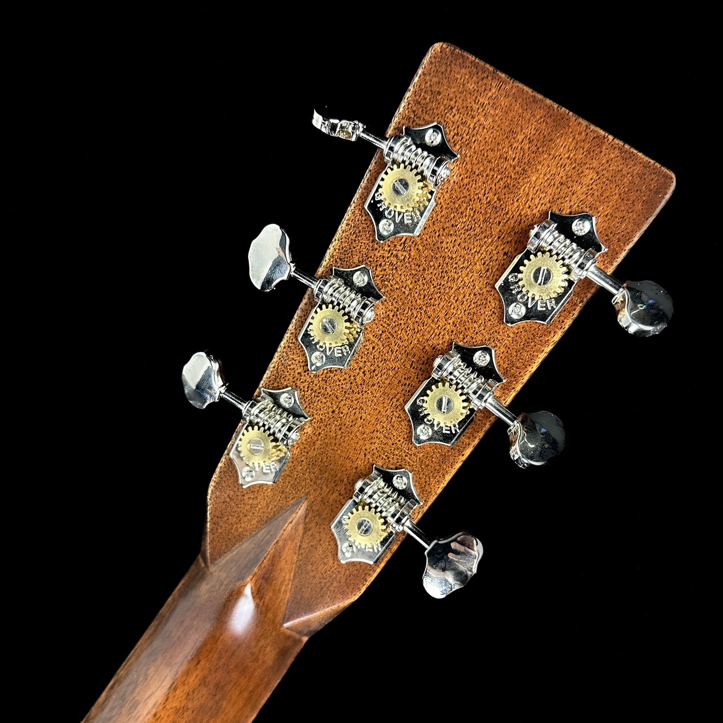 Back of headstock of Martin Custom Shop 28 Style Dread Adirondack/Quilted Sapele.