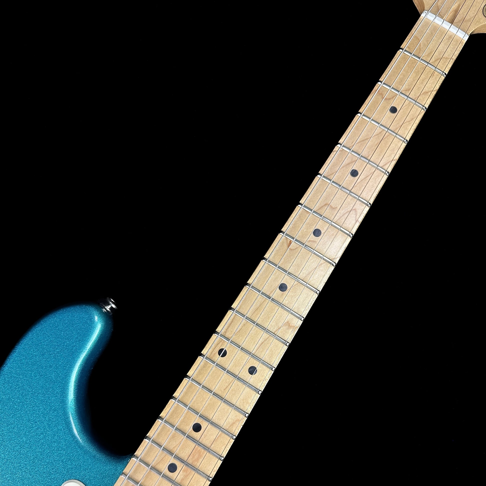 Front of neck of Used G&L USA Legacy Ocean Turquoise.