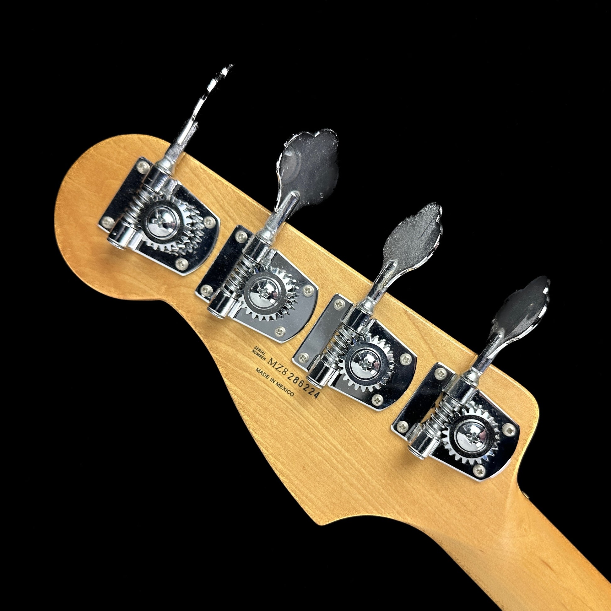 Back of headstock of Used 2009 Fender Standard Precision Bass Brown Sunburst.