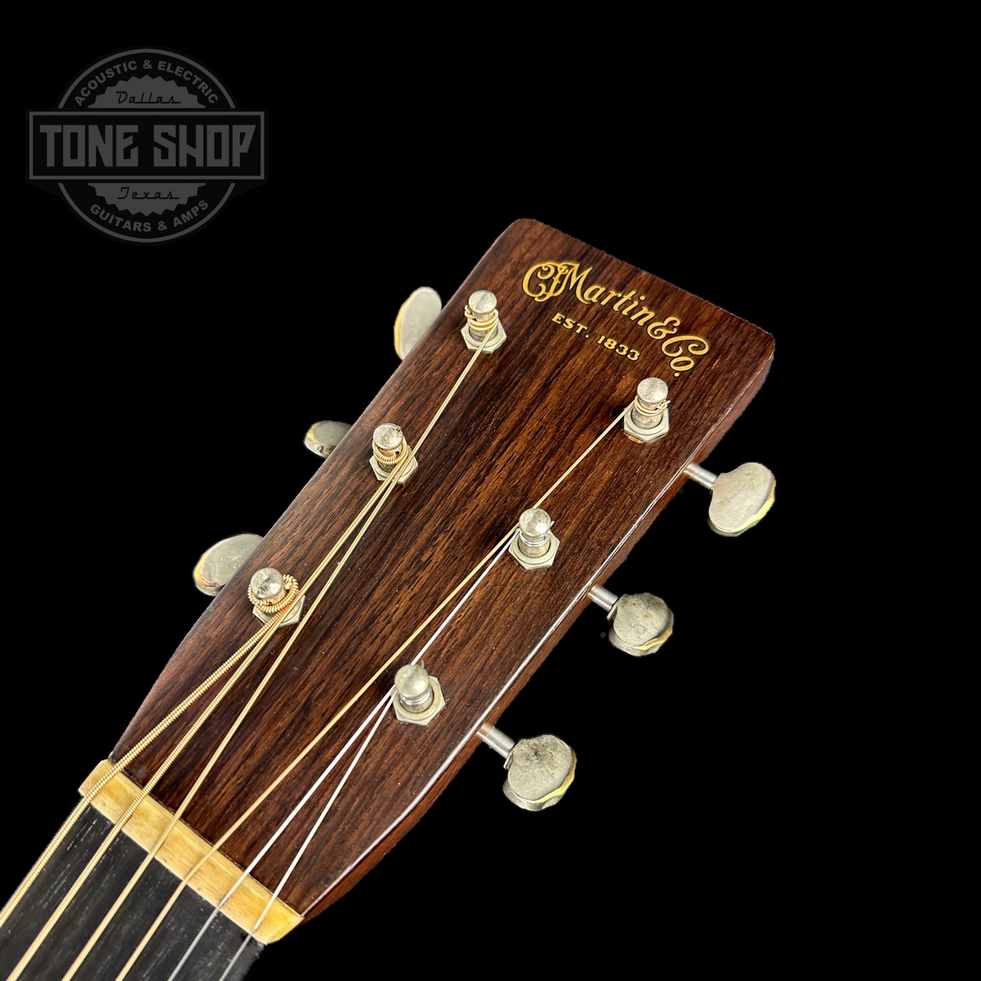 Front of headstock of Used Martin Custom Shop D-28 Authentic 1937 Ambertone w/Stage 1 Aging.