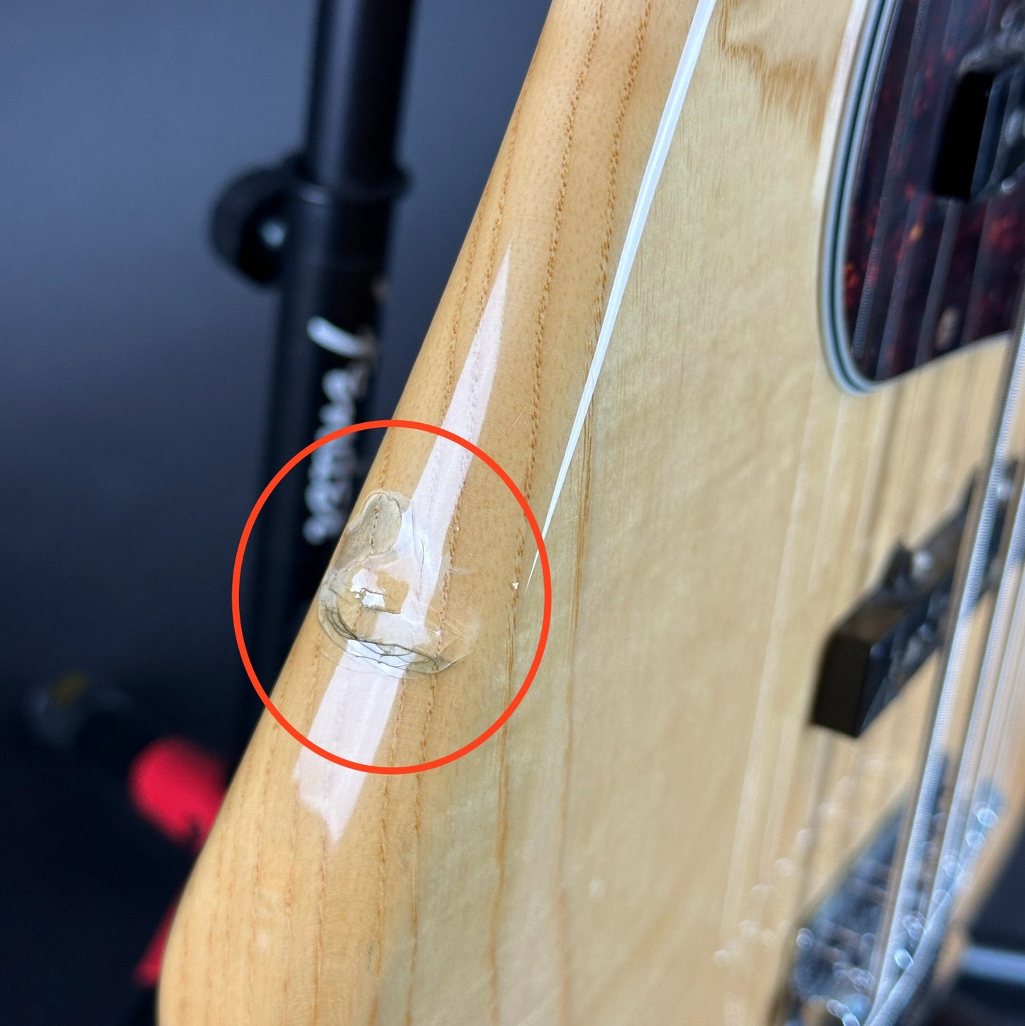 Large dent in side of Used Fender Standard Jazz Bass Natural.