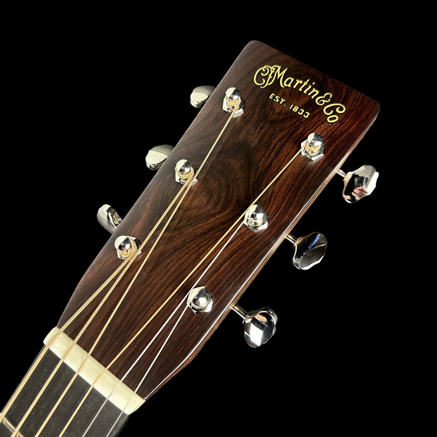 Front of headstock of Martin Custom Shop 28 Style Dread Adirondack/WEIR.