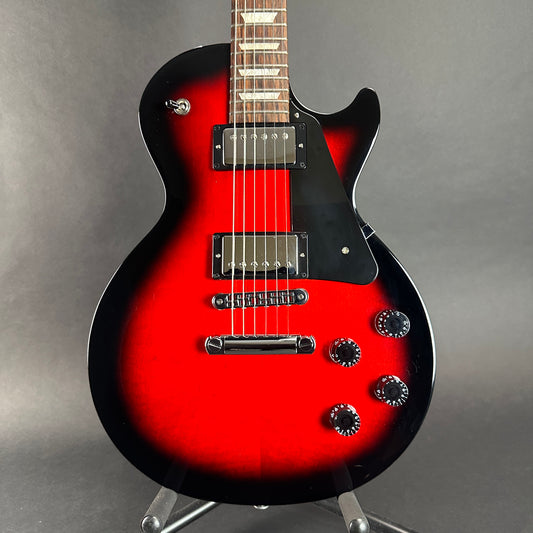 Front of body of Used Gibson Les Paul Studio Red Burst.